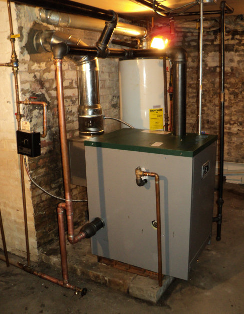 This Peerless gas steam boiler replaced a leaking Crown gas boiler in Orange, Essex County, NJ.