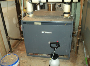 Here is a large Weil McLain gas steam boiler in an apartment building and dental office business in Passaic, NJ