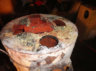 Large old boilers are very dirty when taken apart. As an old oil boiler is replaced it creates new space; new boilers are smaller.